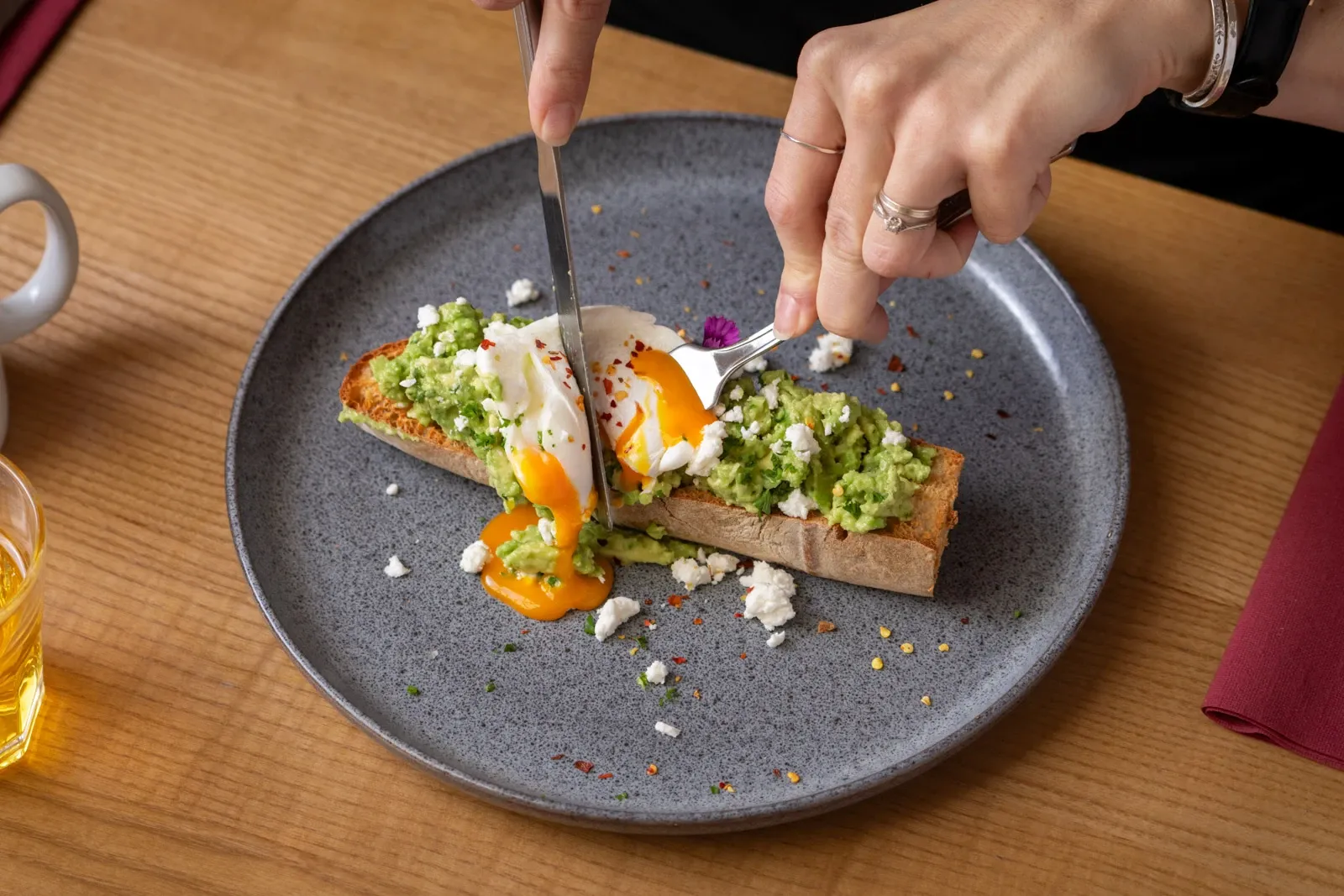 Poached egg and avocado smash on toasted ciabatta