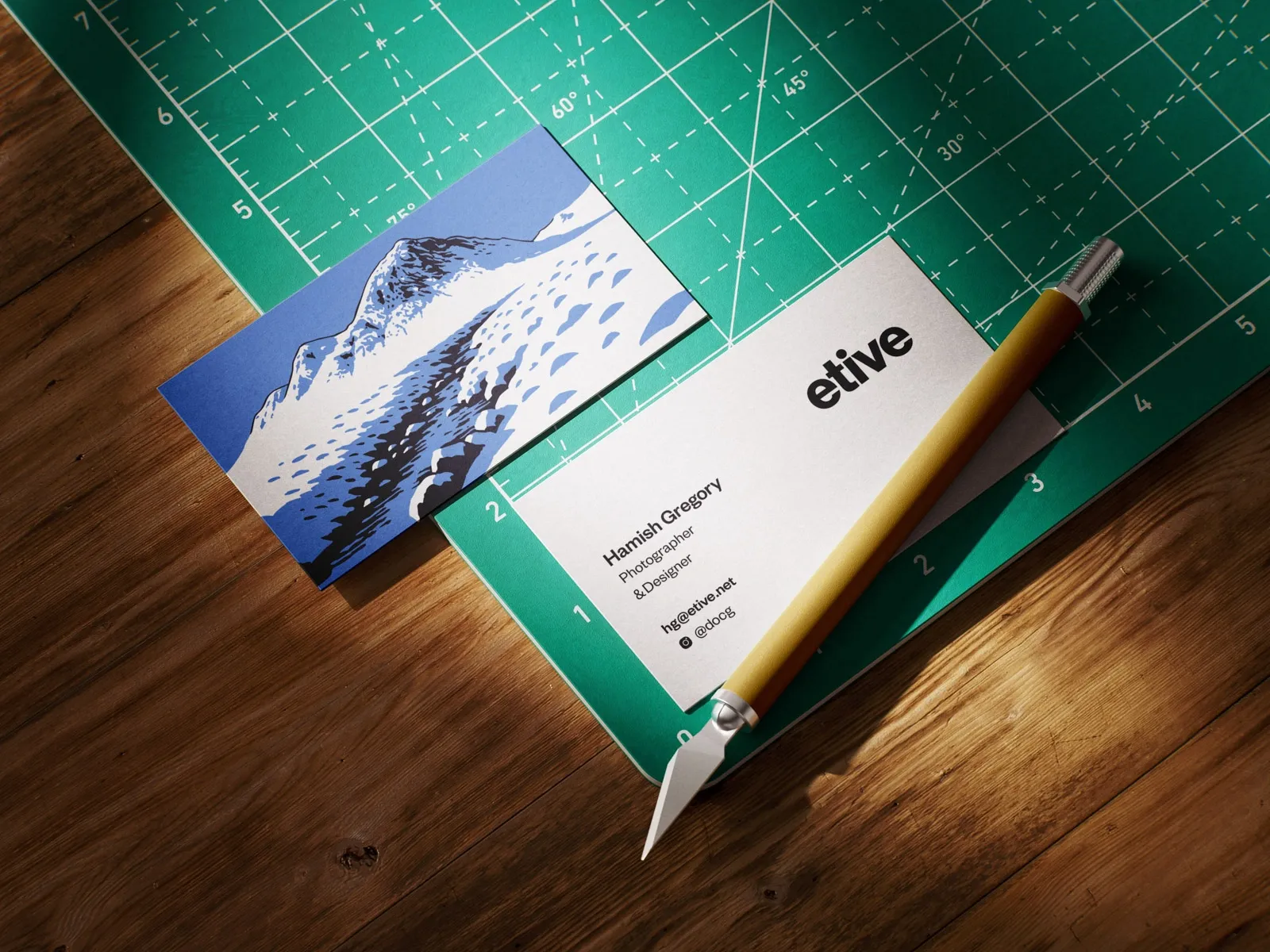 Etive business cards on a cutting mat