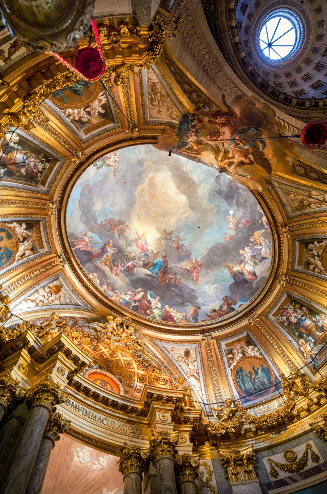 The decorative baroque ceiling of the Lady Chapel chapel of St Sulpice in Paris